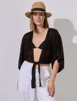 Bolero calado negro de poliéster con mangas 3/4 y frente abierto con lazo.