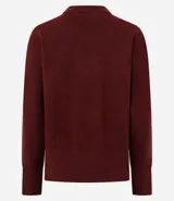 Suéter de punto color celeste, con cuello polo y escote en V. Presenta mangas largas con puños acanalados y terminación de basta también acanalada, ofreciendo un calce cómodo y versátil.