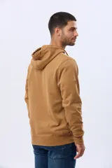 Canguro de felpa color azul marino con cierre frontal completo, capucha con cordones y bolsillos canguro.