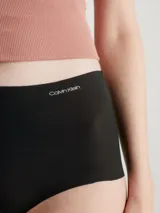 Bombacha hipster de cintura alta Calvin Klein Invisibles, color negro, sin costuras y con logo de la marca en la cintura.