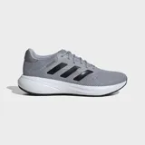 Championes de running Adidas modelo Response Runner en color gris con las icónicas tres tiras en negro. Poseen un exterior de malla transpirable, mediasuela de EVA para una amortiguación cómoda y suela de caucho resistente.
