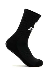 Medias deportivas de caña media Lotto modelo Ciao, color blanco con la marca y el logo en negro en el lateral superior, y apliques de goma antideslizantes negros en la planta del pie.