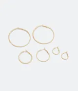 Set de aros dorados con diferentes tamaños y forma circular.