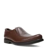 Zapato tipo mocasín de hombre en cuero color marrón coñac, con diseño de costuras visibles en la puntera y suela de goma negra.