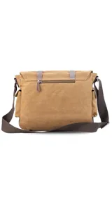 Morral de tela canvas color gris con detalles en cuero marrón, con tapa y doble bolsillo frontal, trasero y laterales. Interior espacioso con compartimento para notebook de 15". Correa de galón regulable para mayor comodidad.