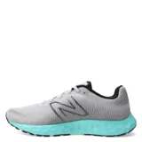Championes de running New Balance modelo 420 V3, color gris con detalles en negro y suela celeste. Presentan el logo "N" en los laterales y están confeccionados en materiales sintéticos y malla.
