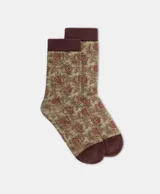 Calcetines de hilo de lurex con toques de plata estampados con diseños exclusivos. Puntera y caña de algodón de color liso en contraste.