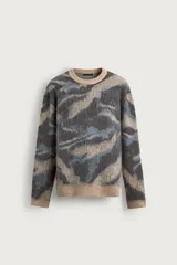 Sweater de punto con diseño jacquard abstracto, cuello redondo, mangas largas y acabado en rib.