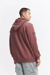 Canguro oversize de algodón con capucha y cordones ajustables. Presenta un diseño de estampa frontal con la frase 'GREAT TIMES' en relieve y bolsillo frontal tipo canguro.