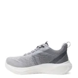 Championes deportivos de mujer color gris, confeccionados en tejido textil con detalles sintéticos, cordones al tono y suela blanca de plataforma.