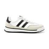 Championes urbanos American Sport, color blanco con detalles en negro y beige. Presentan las tres tiras clásicas de Adidas en color negro.