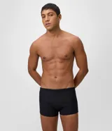 Sunga masculina tipo bóxer color negro, confeccionada en microfibra liviana de poliamida con acabado texturado.