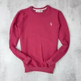 Buzo rojo de algodón texturizado, cuello redondo y mangas largas.