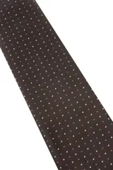 Corbata verde oscuro con estampado floral y pañuelo de bolsillo a juego.