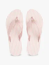 Ojotas de mujer con base rosada con rayas blancas horizontales y tiras de tejido trenzado rosado con logo.