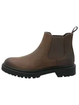 Botín Chelsea de cuero marrón con paneles elásticos laterales y suela de goma dentada. Cuenta con una presilla trasera para facilitar el calce y diseño de punta redonda.