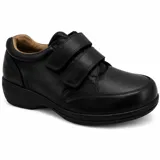 Zapato casual de mujer color negro, con cierre de doble tira de velcro y suela ergonómica.