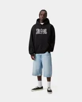 Hoodie Carhartt WIP modelo Hooded World Tour Sweat en color negro, con capucha con cordón ajustable, bolsillo frontal tipo canguro y estampado gráfico en el pecho con efecto difuminado.