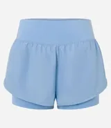 Bermuda deportiva tipo runner, color verde menta, confeccionada en microfibra con cintura elástica. Tiene un corte holgado y bajo redondeado.