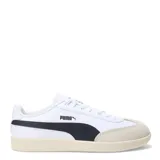 Championes urbanos Puma modelo 9T, color negro con detalles en blanco. Presentan una combinación de cuero sintético y gamuza en la puntera, con la icónica franja lateral de la marca y suela de goma color caramelo.