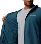Campera cortaviento Columbia Trailborne Jacket Omni-Shield, color azul, con capucha incorporada, cierre frontal y bolsillos laterales con cremallera. Incorpora tecnología repelente a la humedad y manchas.
