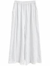 Pantalón blanco de lino, tiro alto con cintura elástica fruncida y bolsillos laterales, corte ancho y fluido.