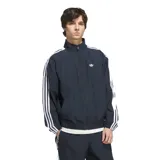 Campera deportiva Adidas Superfire de color negro, con cuello alto, cierre frontal completo y bolsillos laterales. Presenta las clásicas tres tiras blancas en las mangas y el logo del trifolio bordado en el pecho.