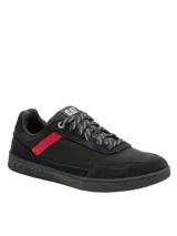 Zapatillas Caterpillar modelo Pause Retro Leather, color negro con detalles en fucsia y cordones bicolor. Confeccionadas con capellada de cuero y lona, forro de malla de nailon y suela de goma.