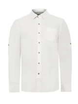 Camisa de manga larga color blanco, confeccionada en popelina de algodón orgánico. Presenta cuello camisero, cierre frontal con botones de madera, un bolsillo en el pecho y mangas ajustables con botones.