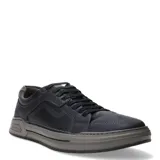 Championes urbanos Democrata modelo Nosu, confeccionados en cuero marrón con textura. Presentan cierre mediante cordones al tono, suela de goma gris con detalle de marca grabado en el talón y puntera con detalle microperforado.