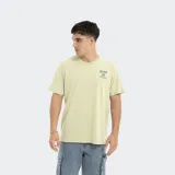 Remera verde de corte holgado con logo Reef estampado en el pecho.