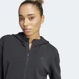 Campera deportiva Adidas con capucha y cierre frontal, color negro con tecnología Climacool y bolsillos laterales con cierre.