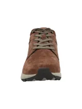 Botín de hombre confeccionado en descarne color marrón, con ajuste de cordones y suela de tecnología honey foam en tono beige. Presenta un diseño robusto con punta redonda y detalles de costuras reforzadas.