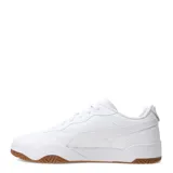 Championes urbanos Puma Tifosi, color blanco con suela de goma color caramelo. Presentan un diseño con costuras acolchadas en la puntera y el logo de la marca en dorado en el lateral.