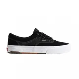 Championes Vans modelo Skate Era Wafflecup, color negro con suela blanca de plataforma y detalles en goma marrón. Presentan diseño de caña baja, cierre con cordones y costuras reforzadas.