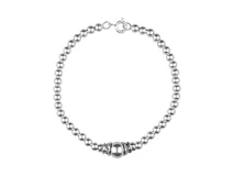 Pulsera de plata italiana 925 con bolitas y dije central esférico.