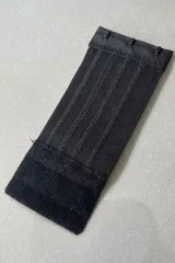 Extensor de contorno de soutien negro con tres ganchos, 15 cm de largo por 6 cm de ancho.