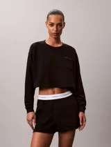 Shorts de estar por casa Calvin Klein, confeccionados en punto de algodón, con cintura elástica con logo de la marca y bolsillos laterales.