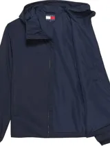 Campera azul marino con capucha y cierre frontal con cremallera. Logo de Tommy Jeans en el pecho.