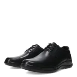 Zapato de vestir para hombre, confeccionado en cuero negro con cierre de cordones, costuras reforzadas y suela de goma antideslizante.