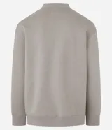 Sweater color beige de algodón y poliéster, de corte holgado, cuello redondo y mangas largas.