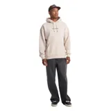 Canguro de abrigo Volcom de corte holgado color beige, con capucha con cordón ajustable, bolsillo tipo canguro y logo bordado en el pecho.