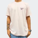 Remera Reebok de manga corta en color rosado, con diseño liso y pequeño logo bordado en el pecho.