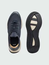 Zapatillas deportivas Boss modelo TTNM EVO_SLON, color marrón con detalles en cuero y suela blanca. Diseño combinado de tejido de punto y cuero, con cordones al tono.