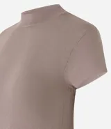 Blusa de punto color celeste, con cuello alto, manga corta y malla texturizada.