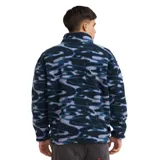 Buzo de polar corderito de manga larga Quiksilver modelo Aries, con diseño de camuflaje en tonos azules y celestes. Cuenta con cuello alto, cierre frontal medio, y bolsillos laterales con cierre.