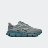 Championes Reebok EO-ZIG Dynamica, color gris con detalles en azul.