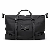 Bolso amplio color negro de material engomado, con asas reforzadas, cierre superior y detalles de tiras frontales con la marca "peach".