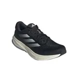 Championes de running Adidas Supernova Rise, color negro con detalles plateados y suela blanca.