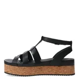 Sandalias tipo franciscanas de cuero negro con plataforma de corcho y suela dentada. Presentan tiras entrecruzadas y cierre con hebilla metálica en el tobillo.